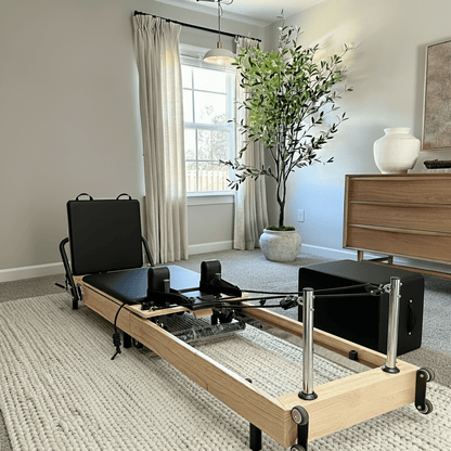 Pilates reformer pliable